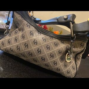 Dooney & bourke signature slouch east west leather canvas bag